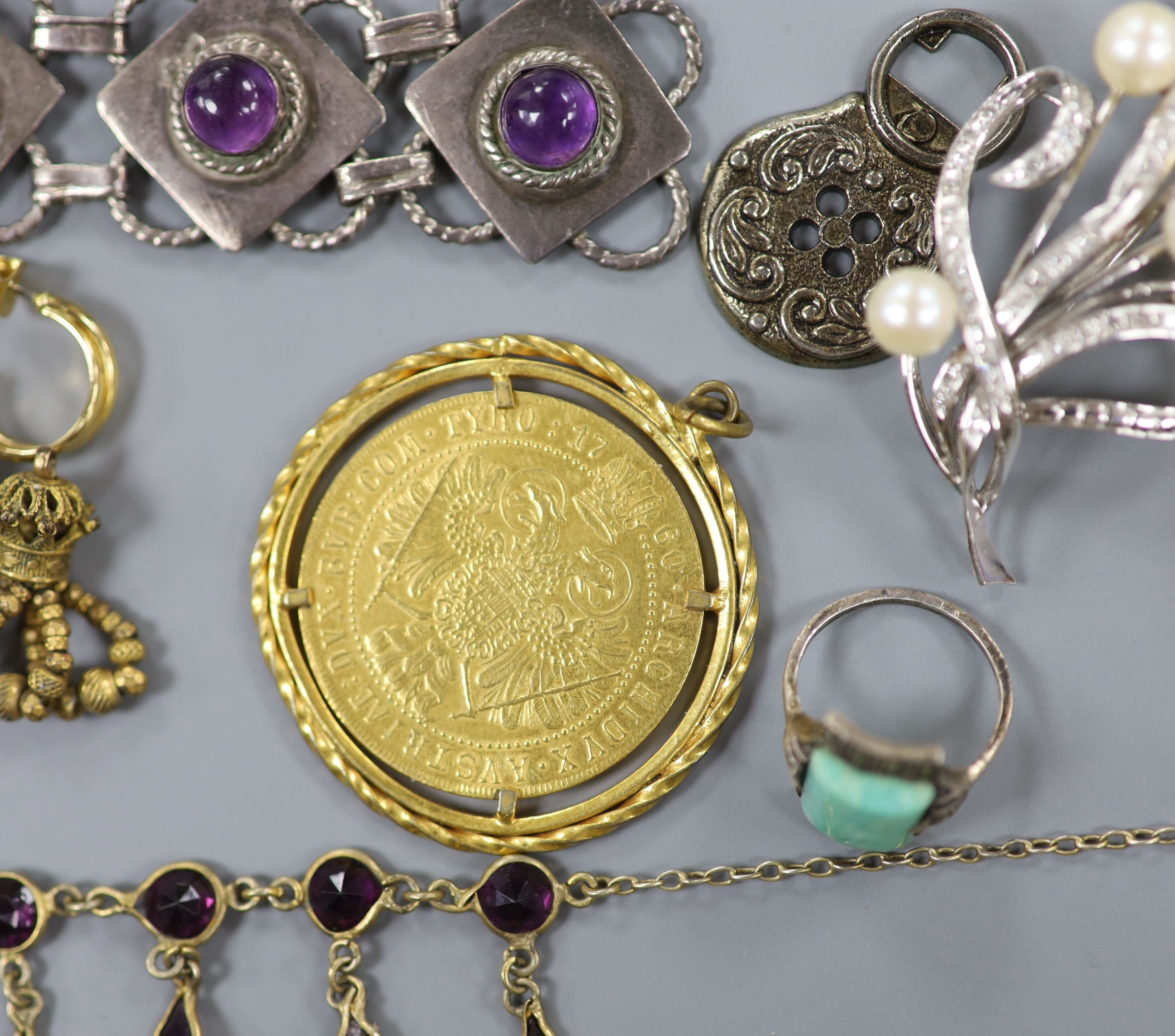 Mixed jewellery including two gilt white metal masonic ball pendants, 14k white metal, diamond and cultured pearl set floral spray brooch, 57mm, gross 11.3 grams and a cabochon amethyst set bracelet.